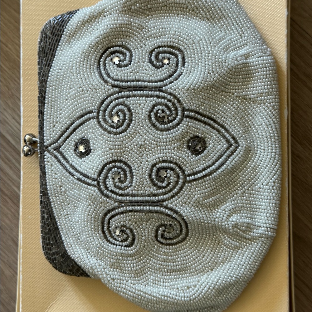 Elegant Beaded Clutch with Swirl Design